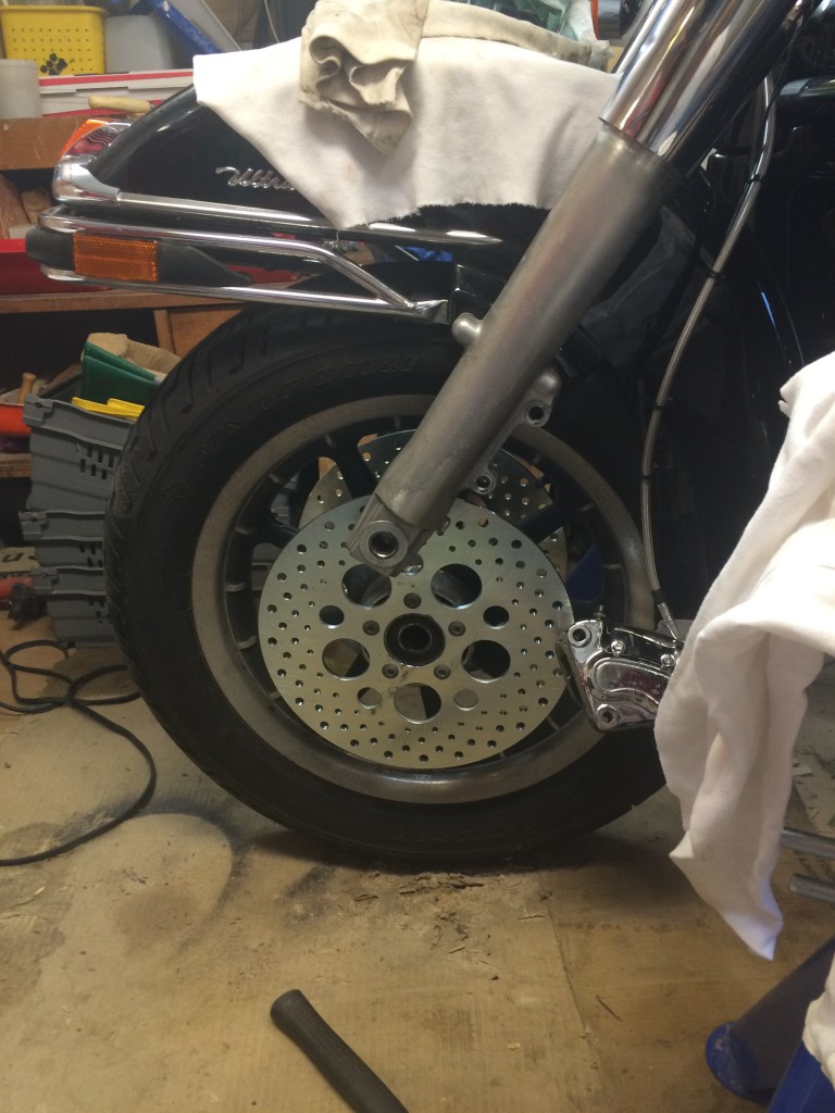 Front disks mounted, wheel almost in place